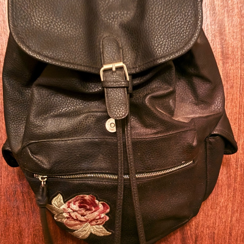 Black Leather Backpack with Floral Detail